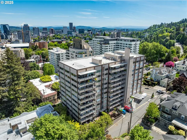 a view of a city with tall buildings