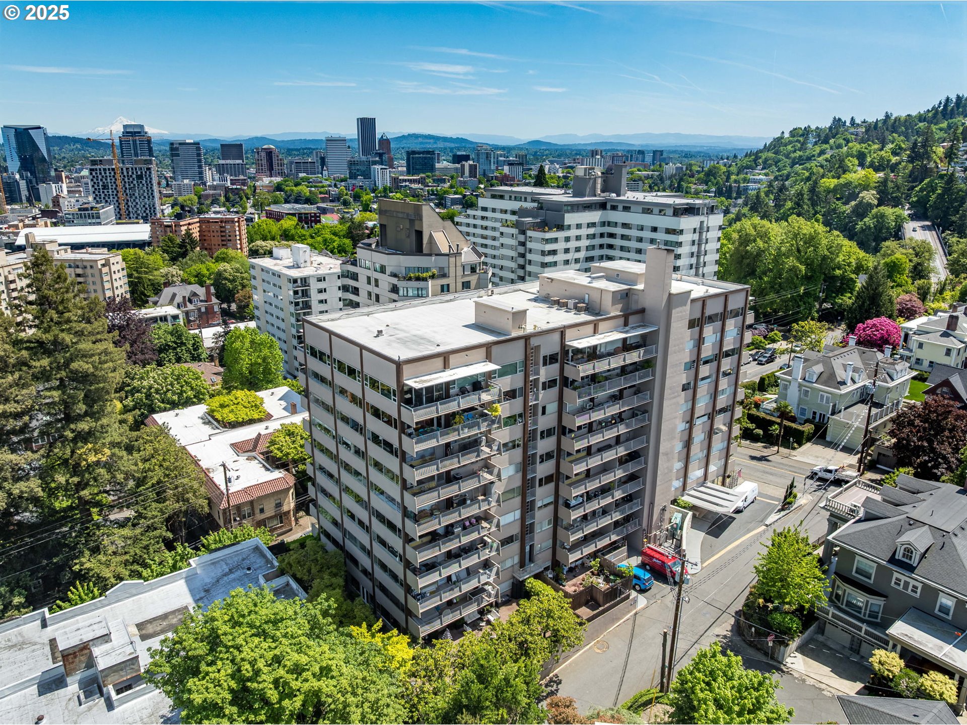 a view of a city with tall buildings