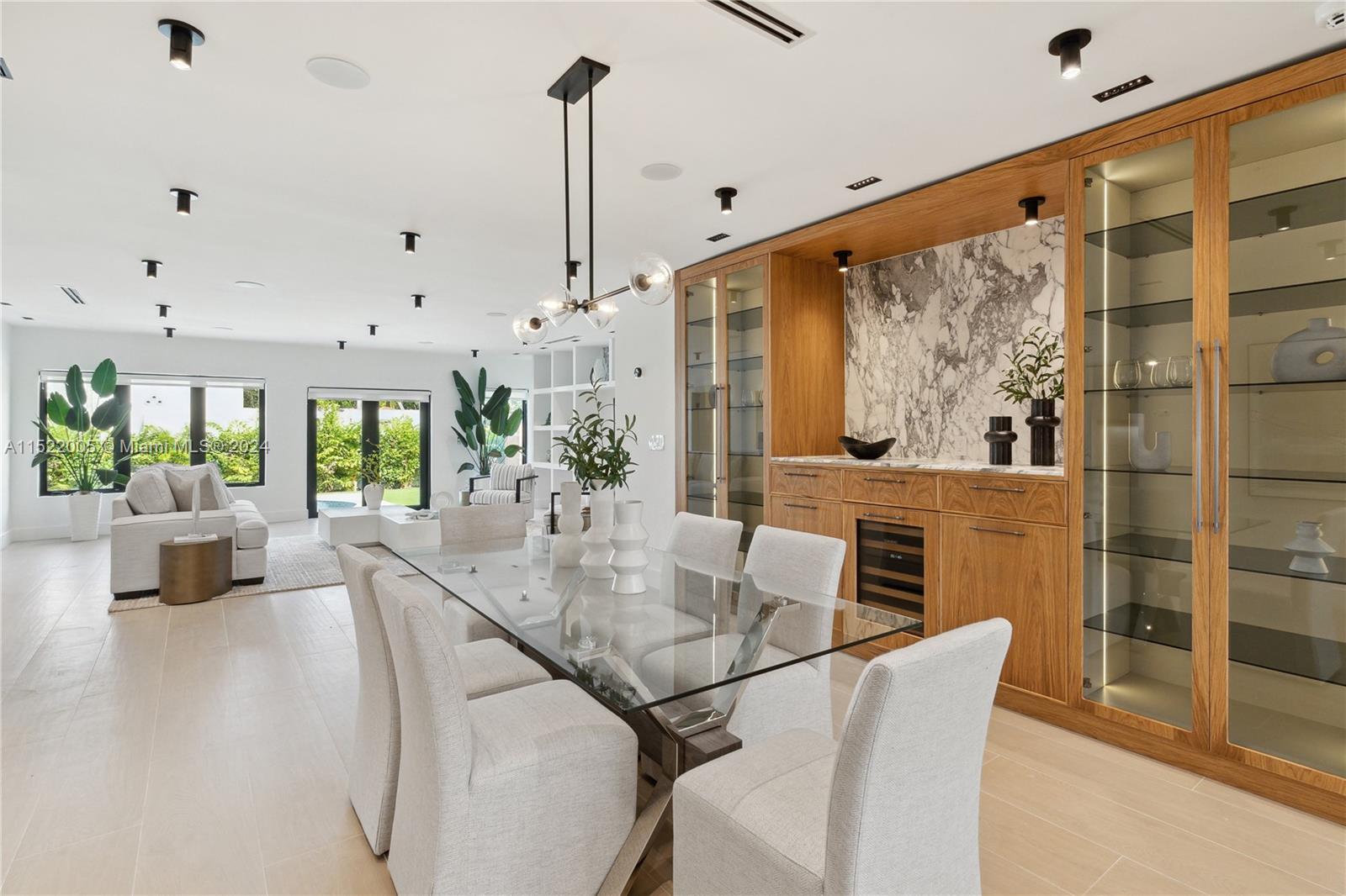 519 Southwest 25th Road Miami, FL 33129 - Photo 1 of 43 a dining room with furniture and window
