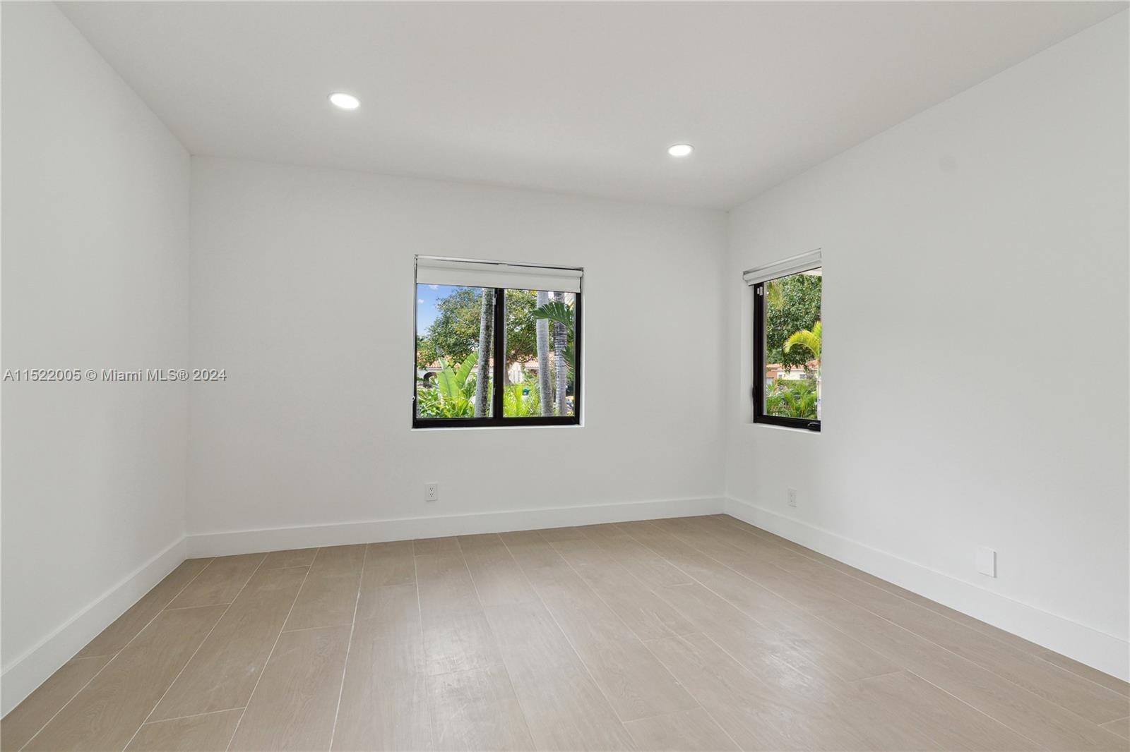 519 Southwest 25th Road Miami, FL 33129 - Photo 28 of 43 an empty room with windows