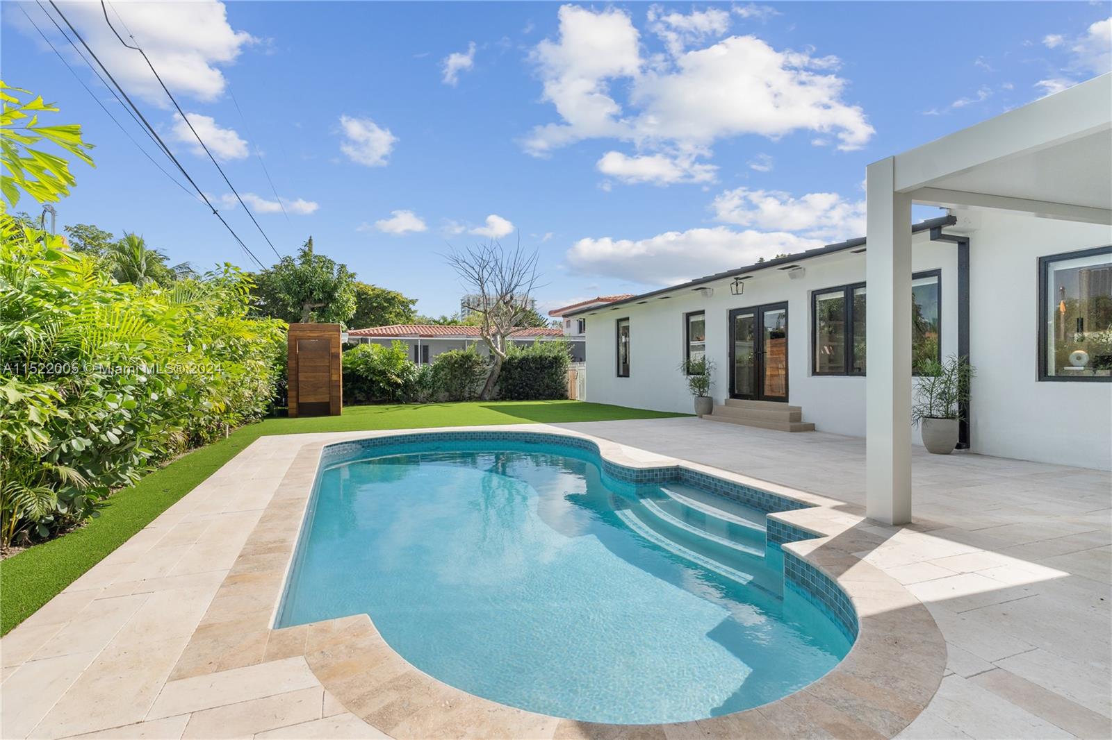 519 Southwest 25th Road Miami, FL 33129 - Photo 33 of 43 a view of a house with swimming pool