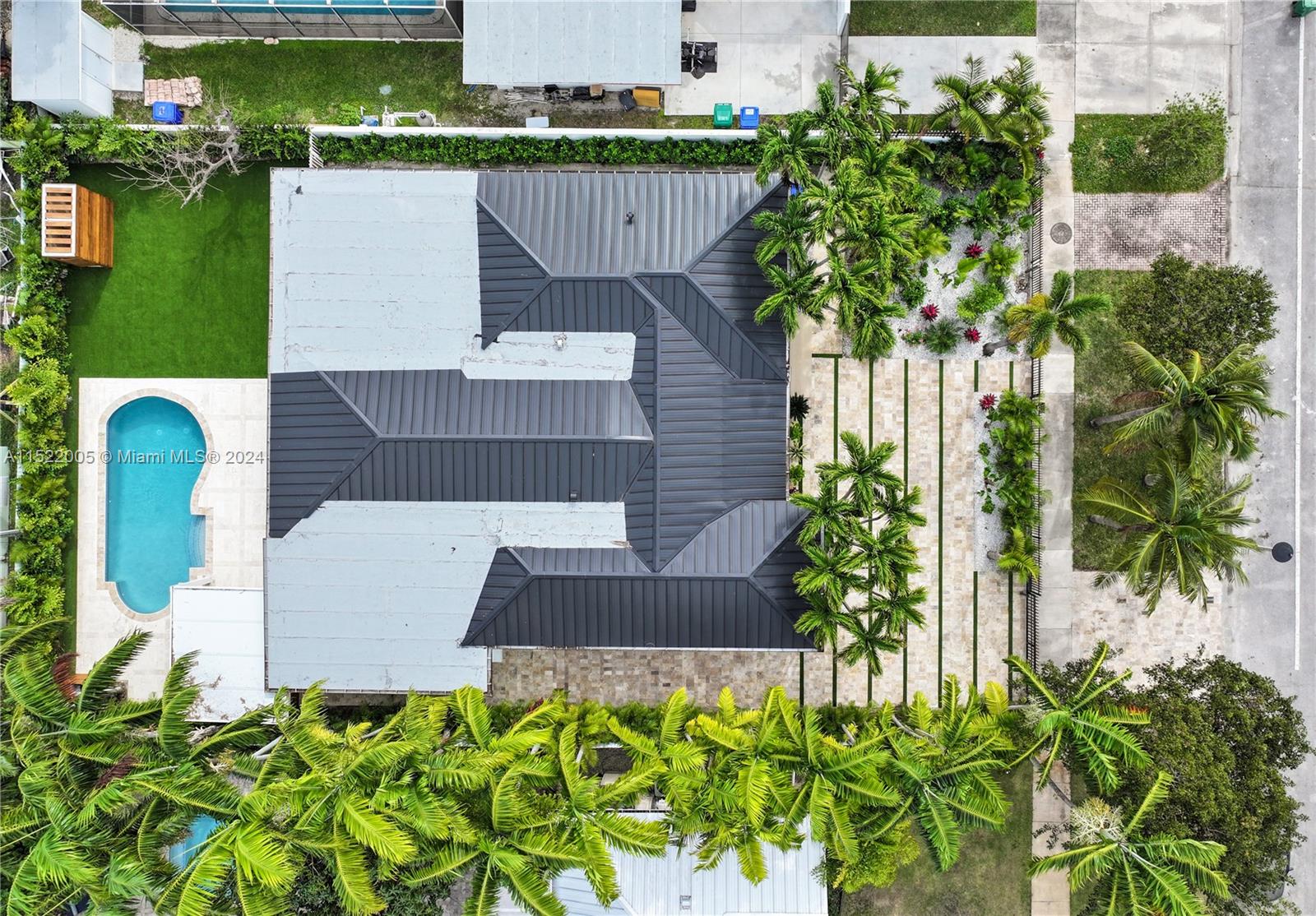 519 Southwest 25th Road Miami, FL 33129 - Photo 36 of 43 an aerial view of a house with a yard and potted plants