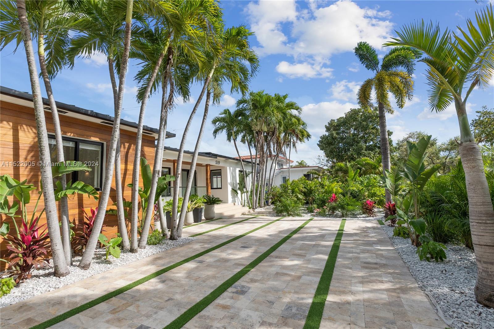 519 Southwest 25th Road Miami, FL 33129 - Photo 38 of 43 a view of a backyard with palm trees