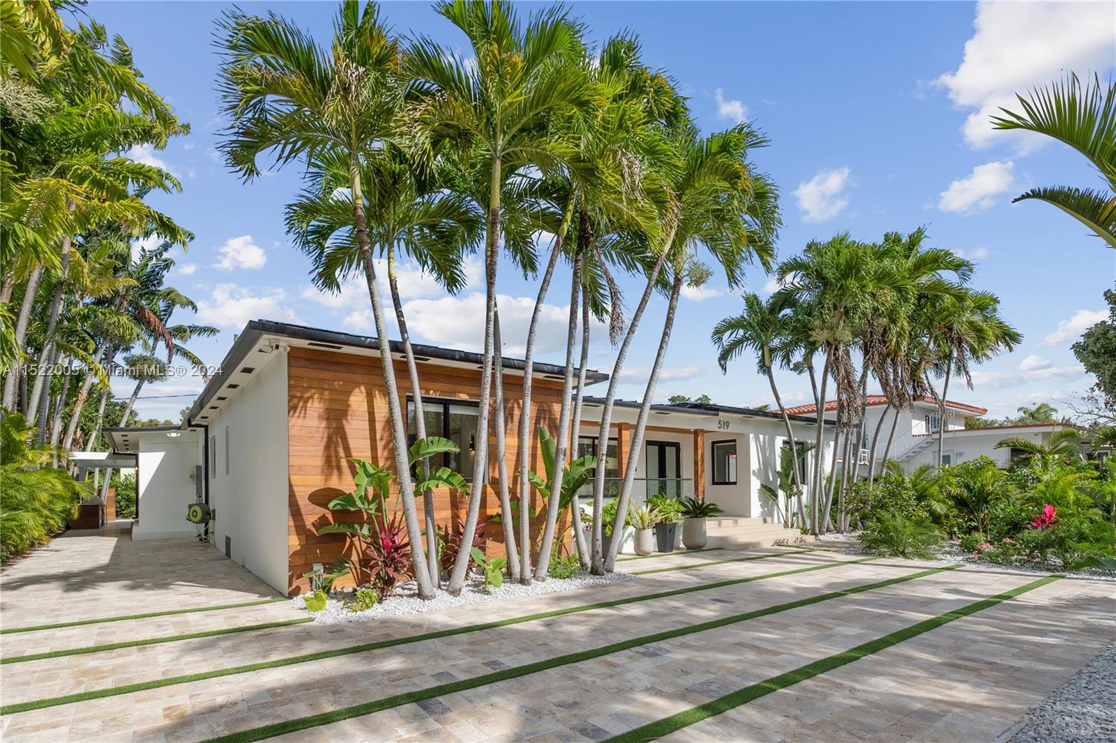 519 Southwest 25th Road Miami, FL 33129 - Photo 39 of 43 front view of house with a garden