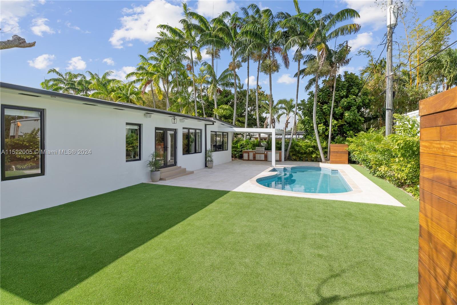 519 Southwest 25th Road Miami, FL 33129 - Photo 4 of 43 a view of outdoor space yard deck and swimming pool