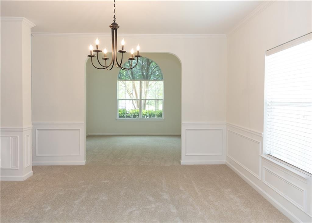 502 Streamside Place Canton, GA 30115 - Photo 7 of 33 a view of an empty room and window