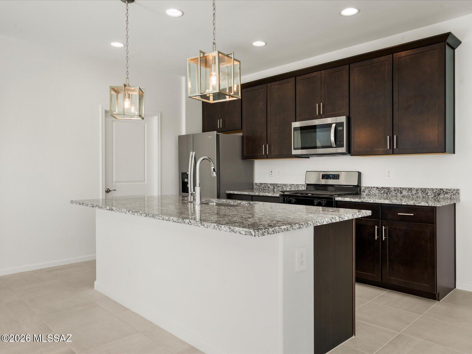 5160 West Bowen House Road Tucson, AZ 85757 - Photo 3 of 15 Photo is not of the actual home, but is an inspirational photo of builder’s model home and may depict options, furnishings, and/or decorator features that are not included