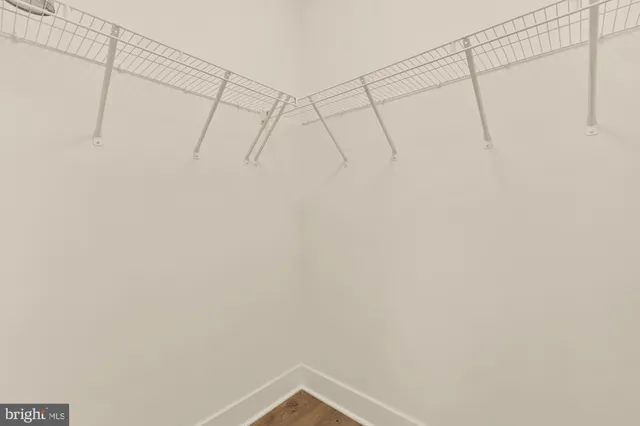 a view of a room with racks on the wall