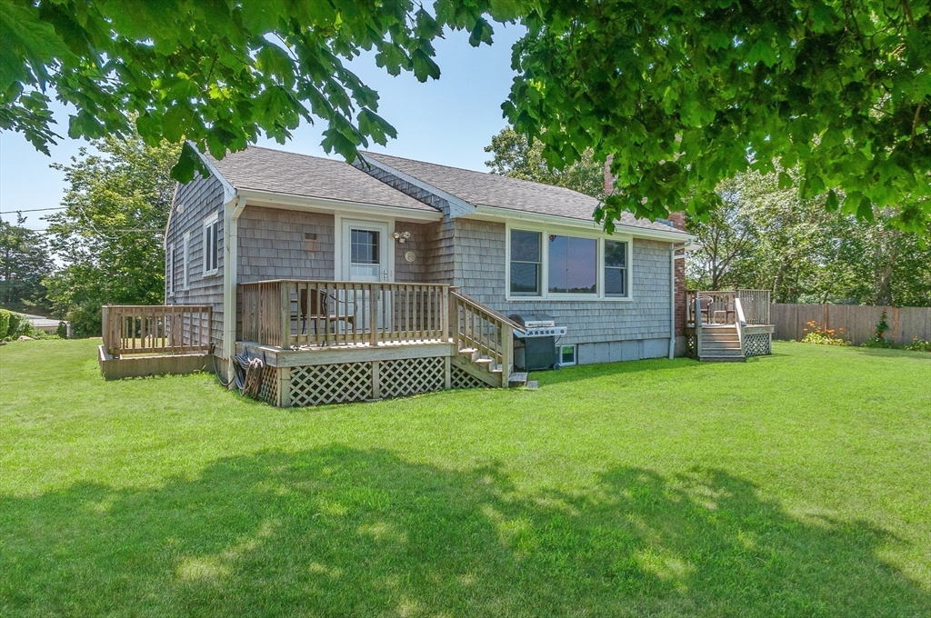 27 Over Jordan Road Wareham, MA 02571 - Photo 11 of 28 a view of a house with a backyard