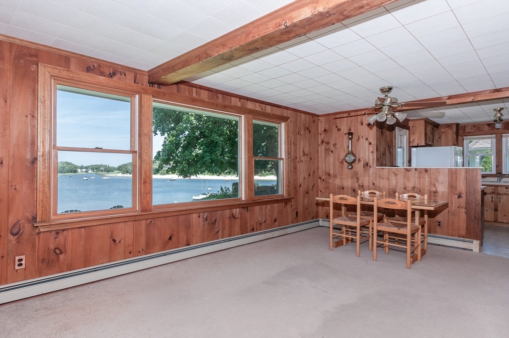 27 Over Jordan Road Wareham, MA 02571 - Photo 17 of 28 a dining room with furniture and windows