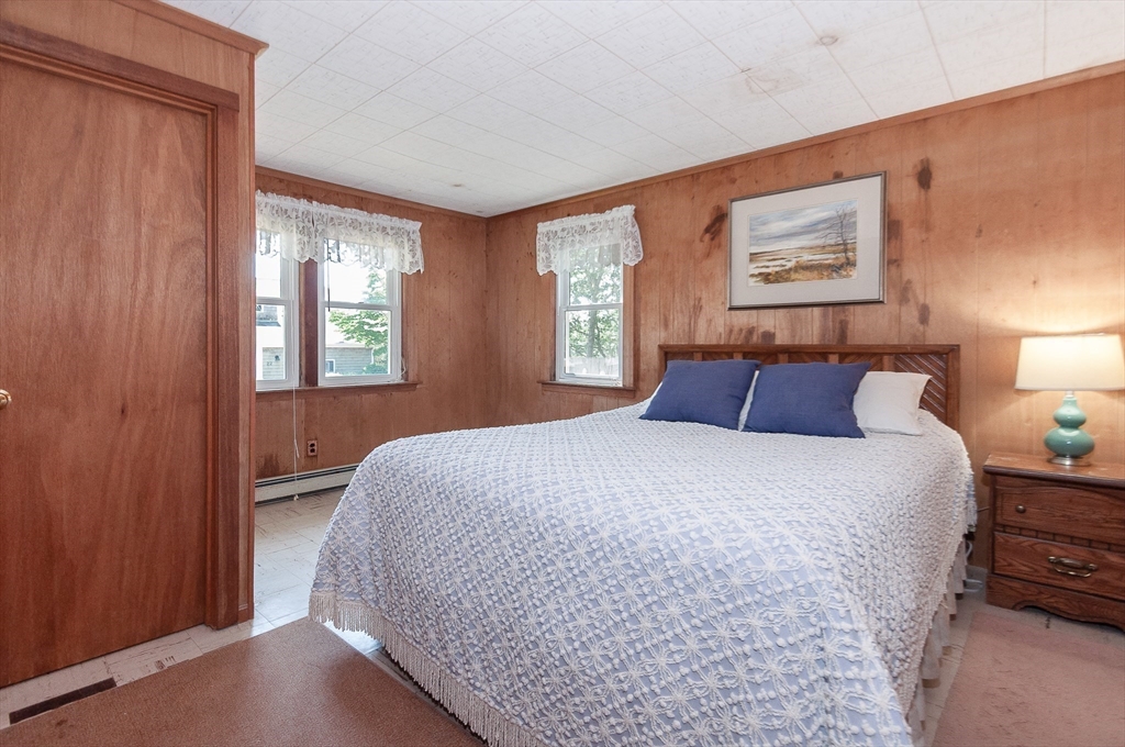 27 Over Jordan Road Wareham, MA 02571 - Photo 23 of 28 a bedroom with a bed and window