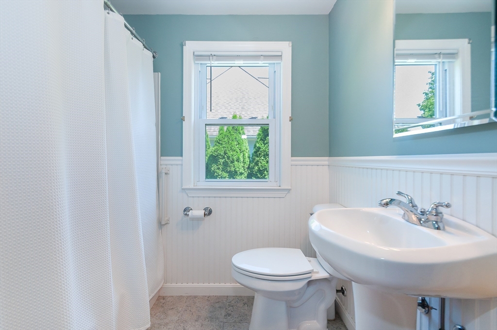 27 Over Jordan Road Wareham, MA 02571 - Photo 26 of 28 a bathroom with a sink a toilet and a mirror