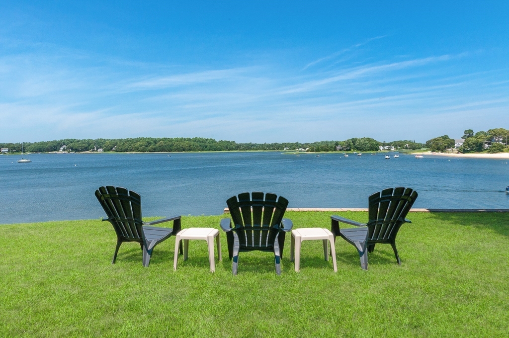 27 Over Jordan Road Wareham, MA 02571 - Photo 8 of 28 a view of chairs and table in a big yard