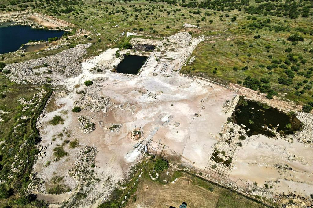 567 Hendrick Ranch Road Lueders, TX 79533 - Photo 30 of 39 a view of a wooden floor in front of building