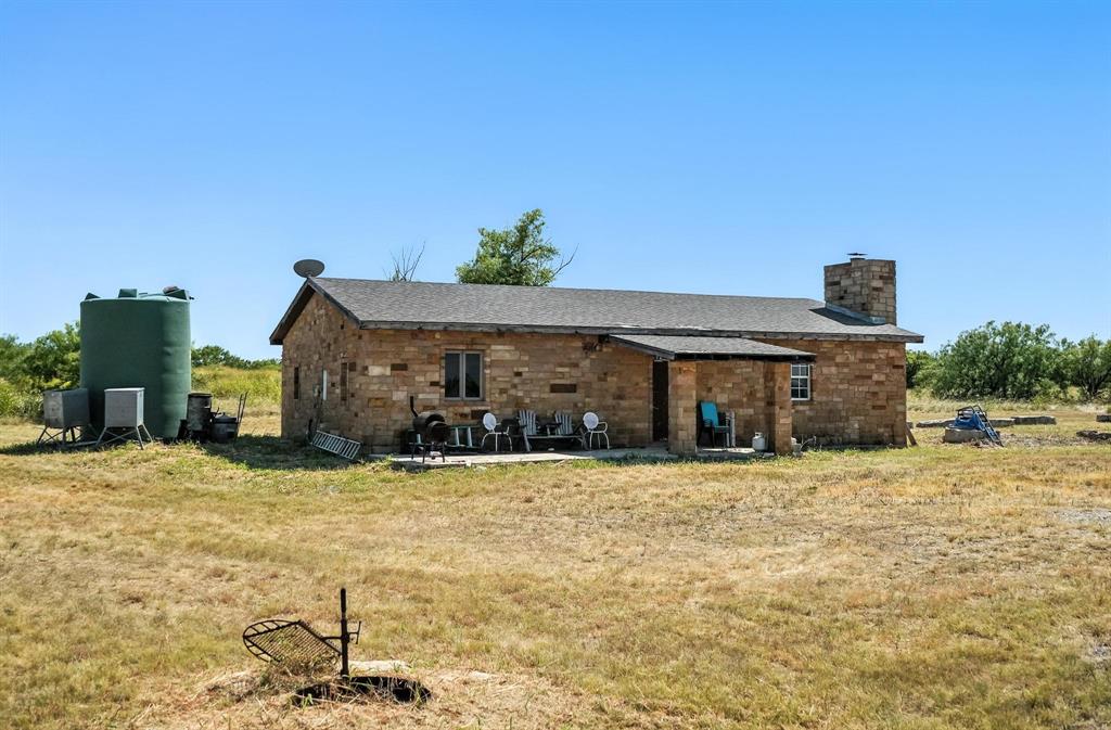 567 Hendrick Ranch Road Lueders, TX 79533 - Photo 39 of 39 a house view with a outdoor space