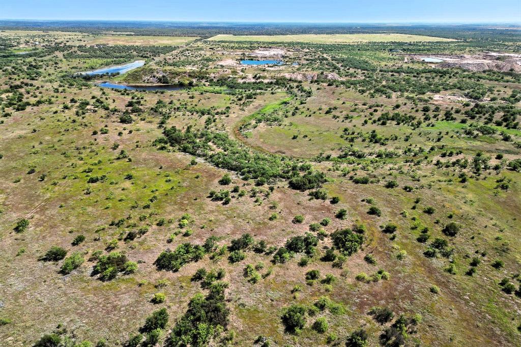 567 Hendrick Ranch Road Lueders, TX 79533 - Photo 8 of 39 a view of a city with an outdoor space