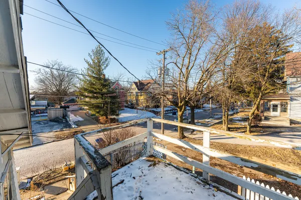a view of a patio with a yard