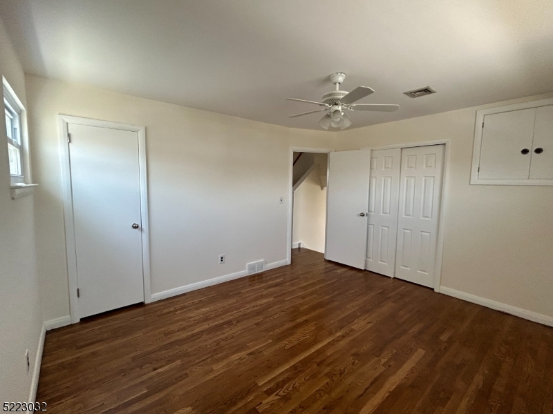 2724 Hickory Road Union, NJ 07083 - Photo 12 of 16 wooden floor in an empty room with a window