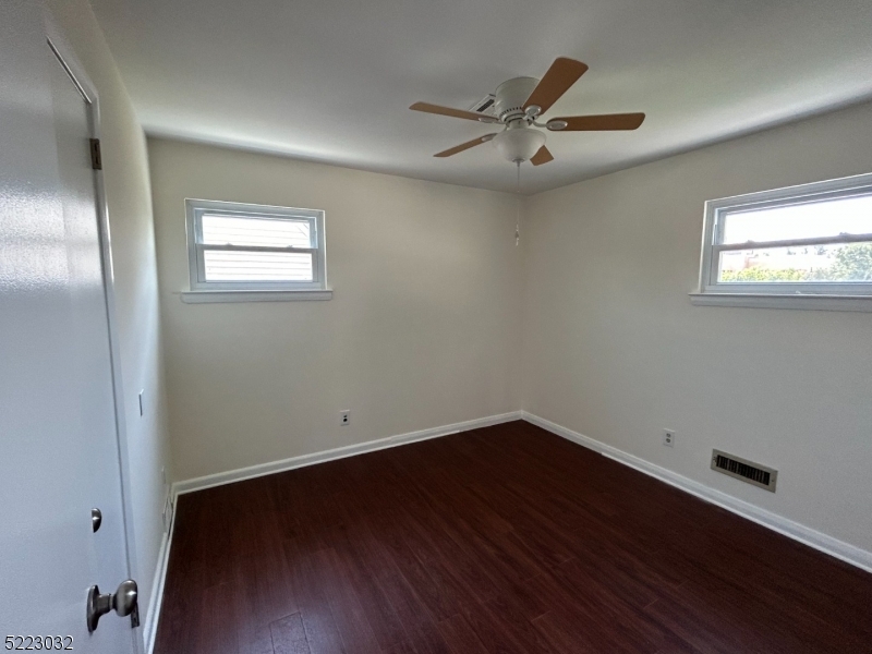 2724 Hickory Road Union, NJ 07083 - Photo 13 of 16 a view of empty room with wooden floor and fan