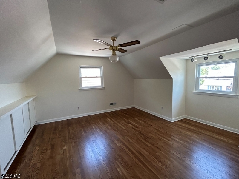 2724 Hickory Road Union, NJ 07083 - Photo 15 of 16 an empty room with wooden floor and windows