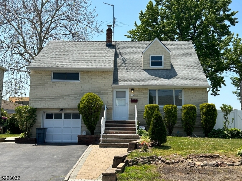 2724 Hickory Road Union, NJ 07083 - Photo 16 of 16 a front view of a house with garden