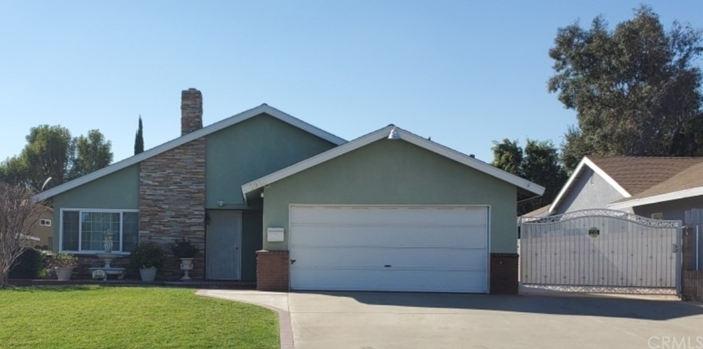 7950 Layton Street Rancho Cucamonga, CA 91730 - Photo 1 of 1 a view of a house with a backyard