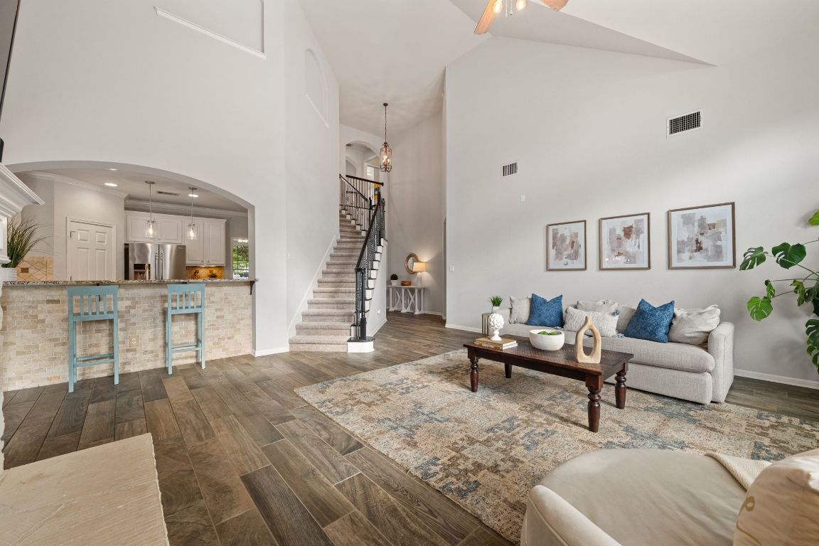 3209 Indigo Waters Drive Austin, TX 78732 - Photo 11 of 40 a living room with furniture and wooden floor
