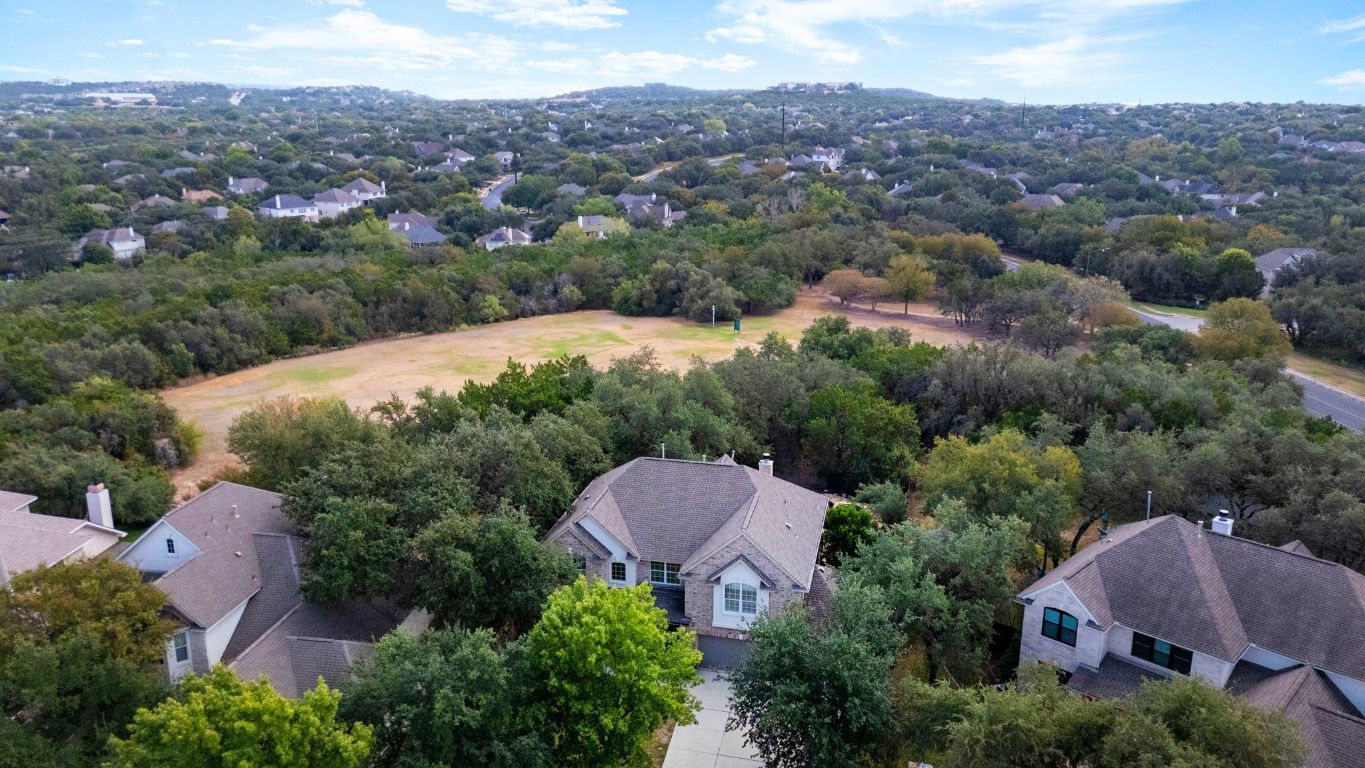 3209 Indigo Waters Drive Austin, TX 78732 - Photo 35 of 40 an aerial view of a house and yard