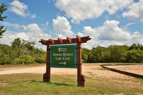 a sign board with ocean view