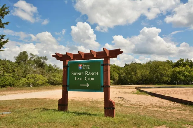 a sign board with ocean view