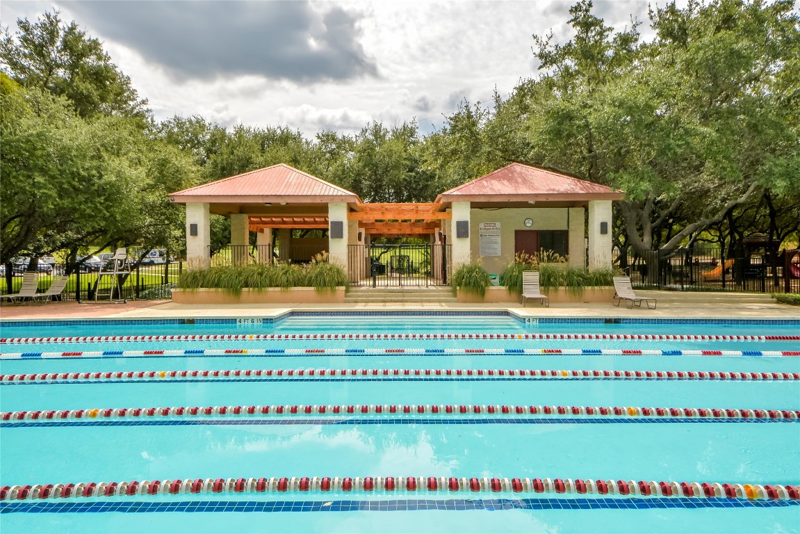 3209 Indigo Waters Drive Austin, TX 78732 - Photo 38 of 40 a front view of a building with garden