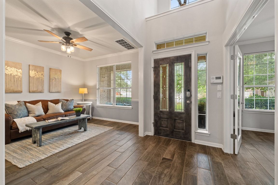 3209 Indigo Waters Drive Austin, TX 78732 - Photo 7 of 40 a living room with furniture and wooden floor