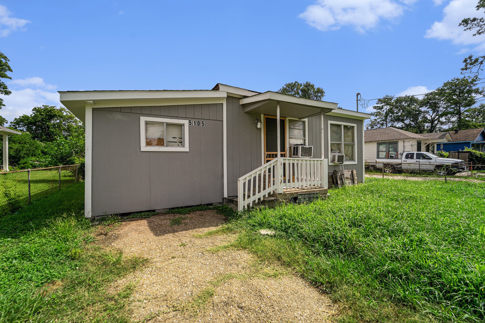 5105 Earline Street Houston, TX 77016 - Photo 1 of 8 a view of a house with a yard and plants
