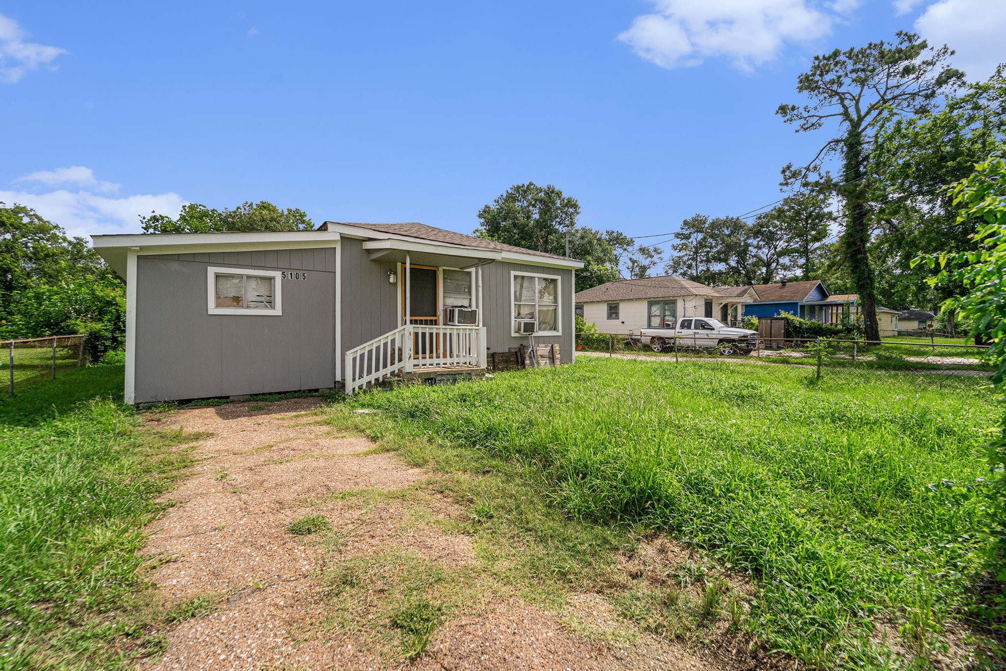 5105 Earline Street Houston, TX 77016 - Photo 2 of 8 front view of house with a yard