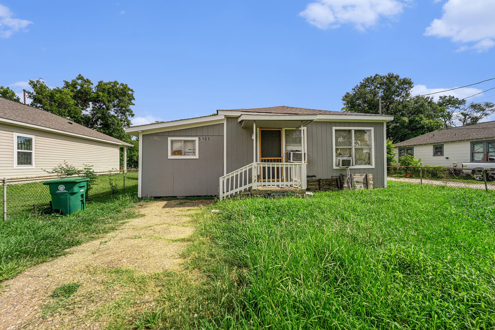 5105 Earline Street Houston, TX 77016 - Photo 3 of 8 a view of a house with backyard and a garden