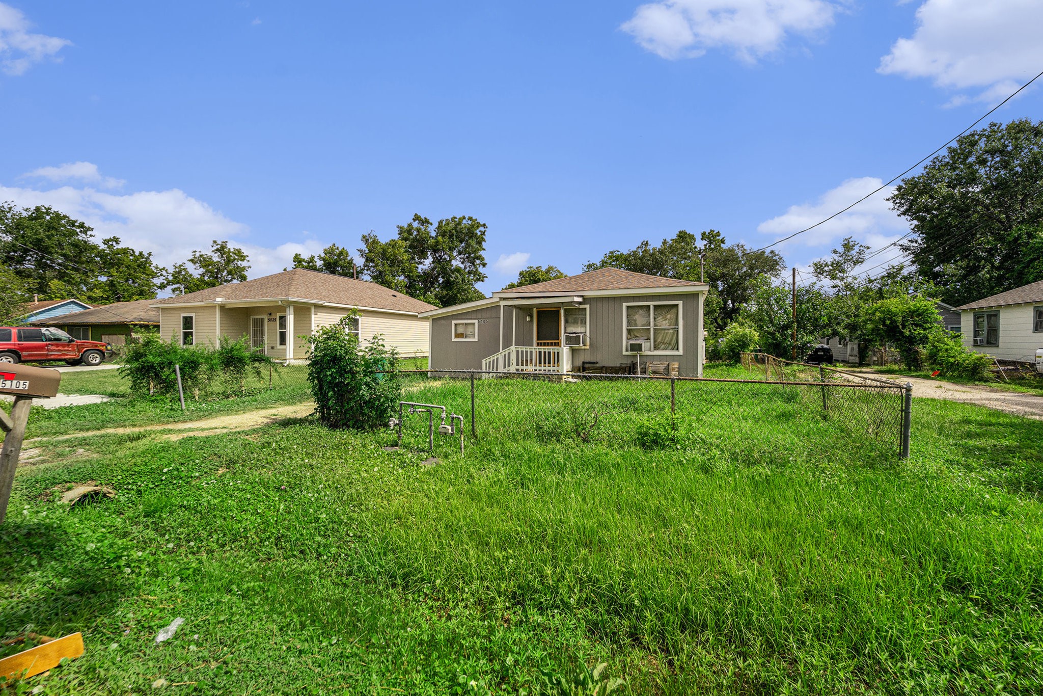 5105 Earline Street Houston, TX 77016 - Photo 4 of 8 a view of a house with a yard