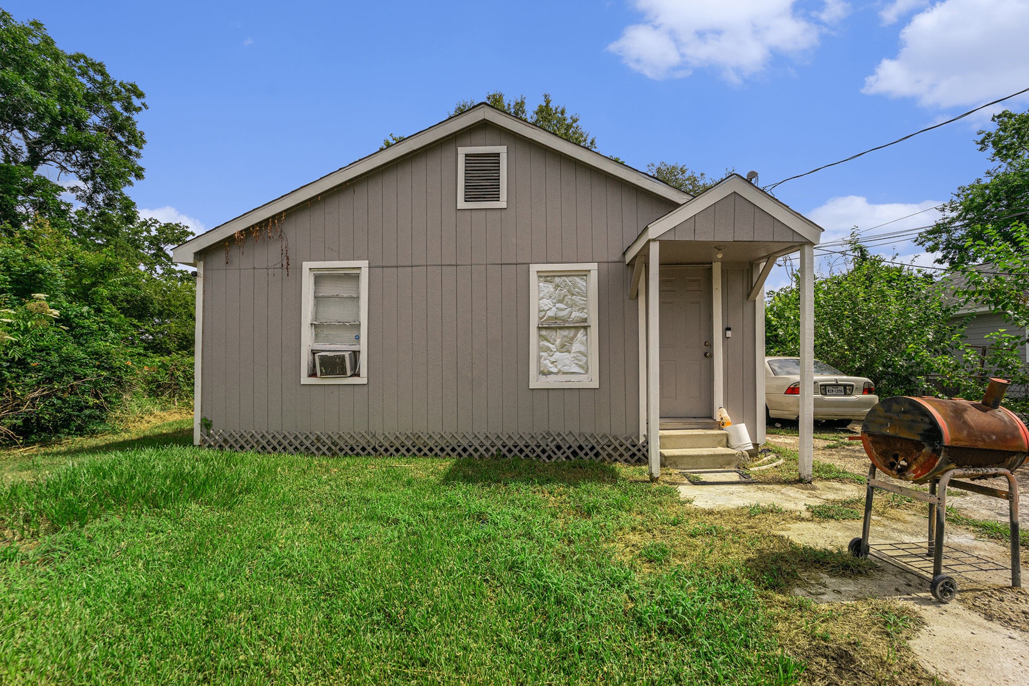 5105 Earline Street Houston, TX 77016 - Photo 7 of 8 a front view of a house with garden