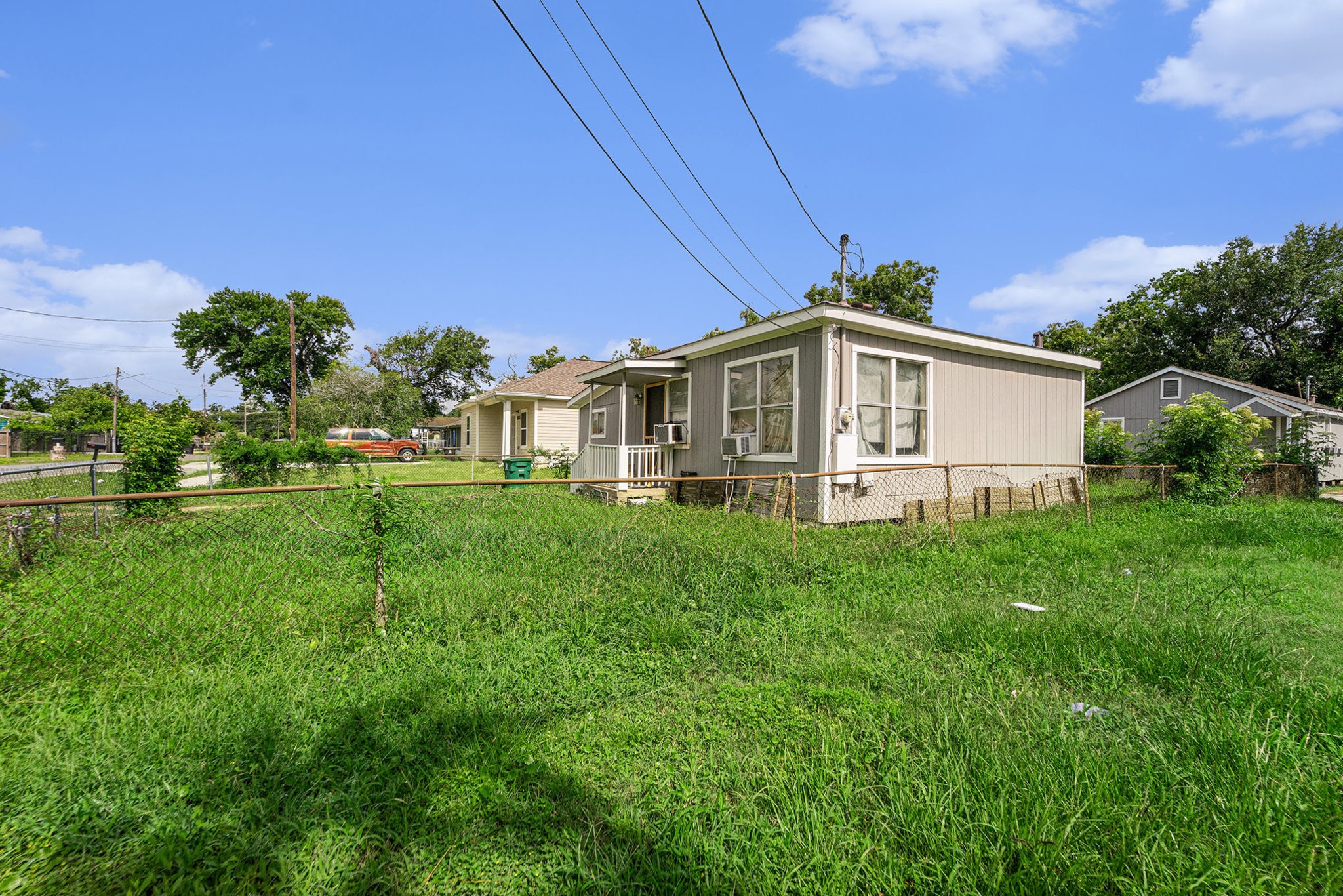 5105 Earline Street Houston, TX 77016 - Photo 8 of 8 a view of a house with a big yard