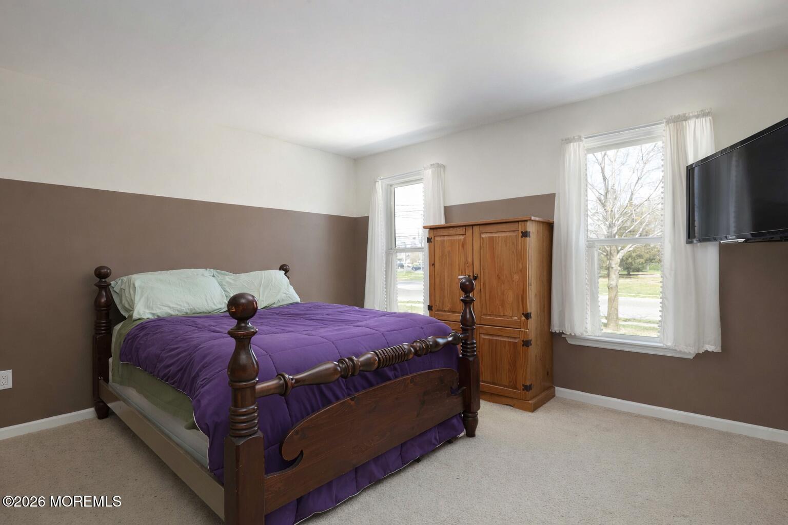 96 Atrium Drive Brick, NJ 08723 - Photo 17 of 39 a bed room with a bed and a window