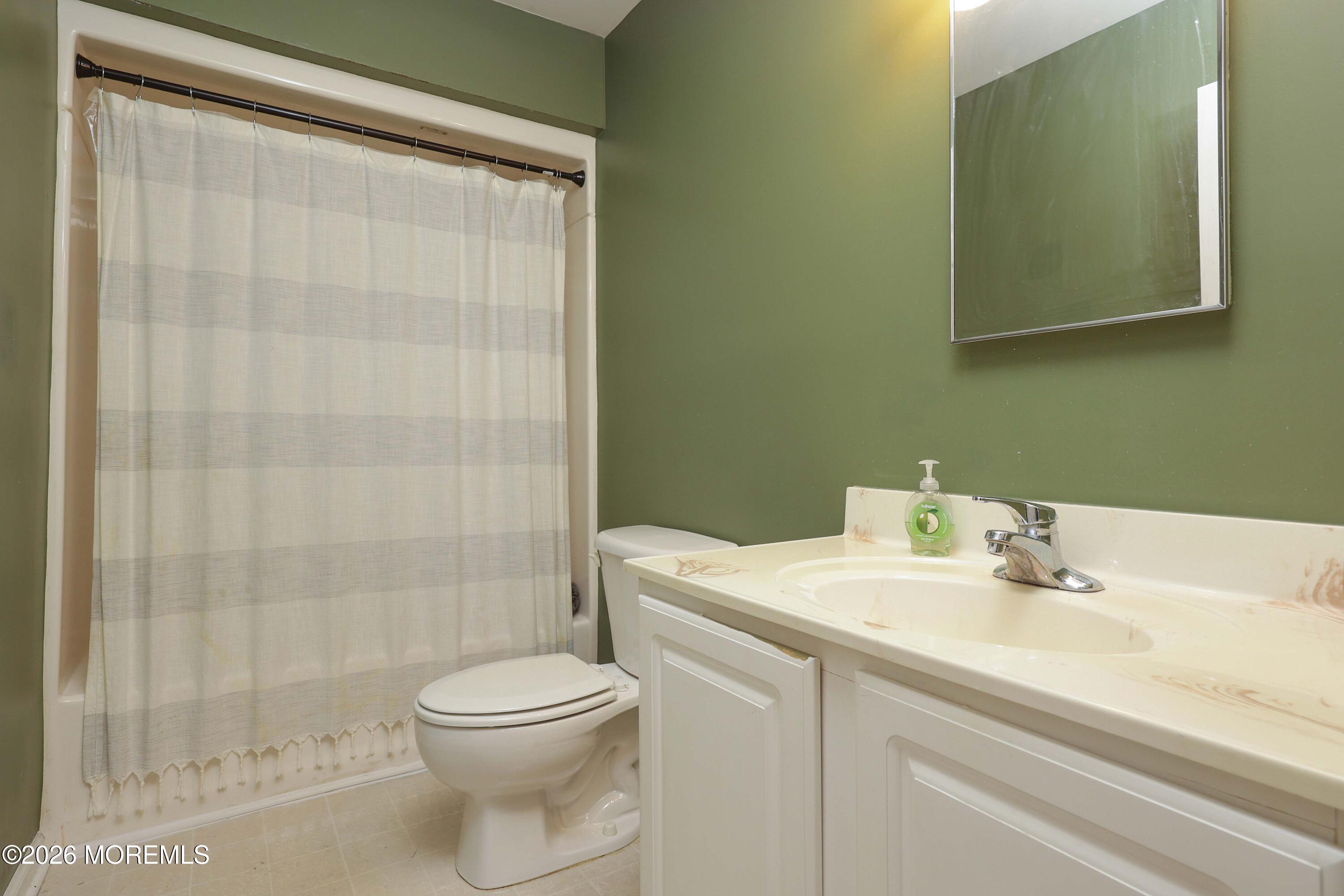 96 Atrium Drive Brick, NJ 08723 - Photo 22 of 39 a bathroom with a sink a toilet and shower