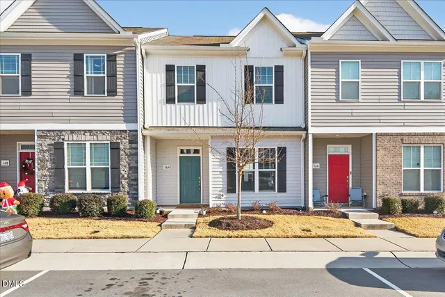 a view of a street with cars