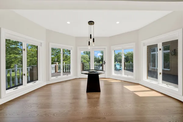 a bedroom with a bed and a ceiling fan