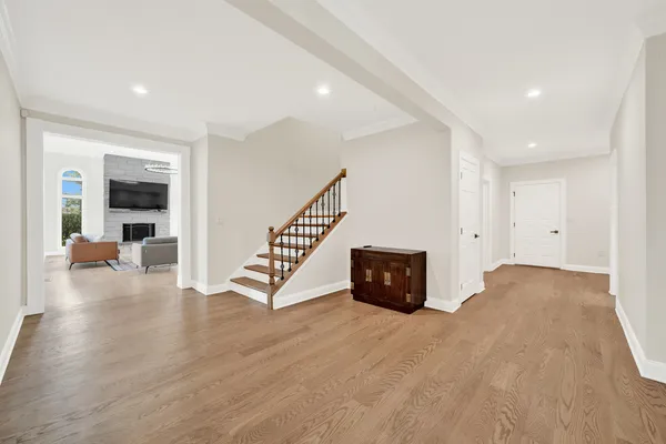 a bedroom with a large bed and a large window