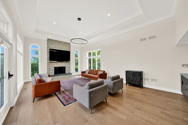 an aerial view of a house with garden space and street view