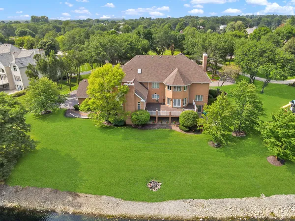 a view of entryway with stairs and front door
