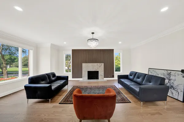 a view of a room with wooden floor and balcony
