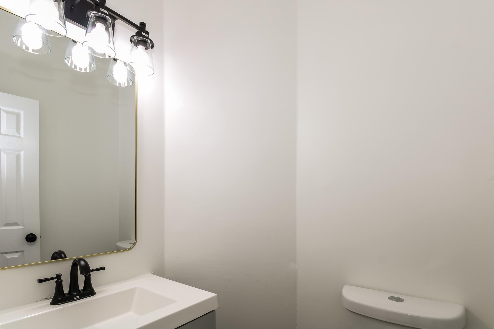 8729 Dexter Road Memphis, TN 38016 - Photo 11 of 20 Half bath featuring vanity and toilet