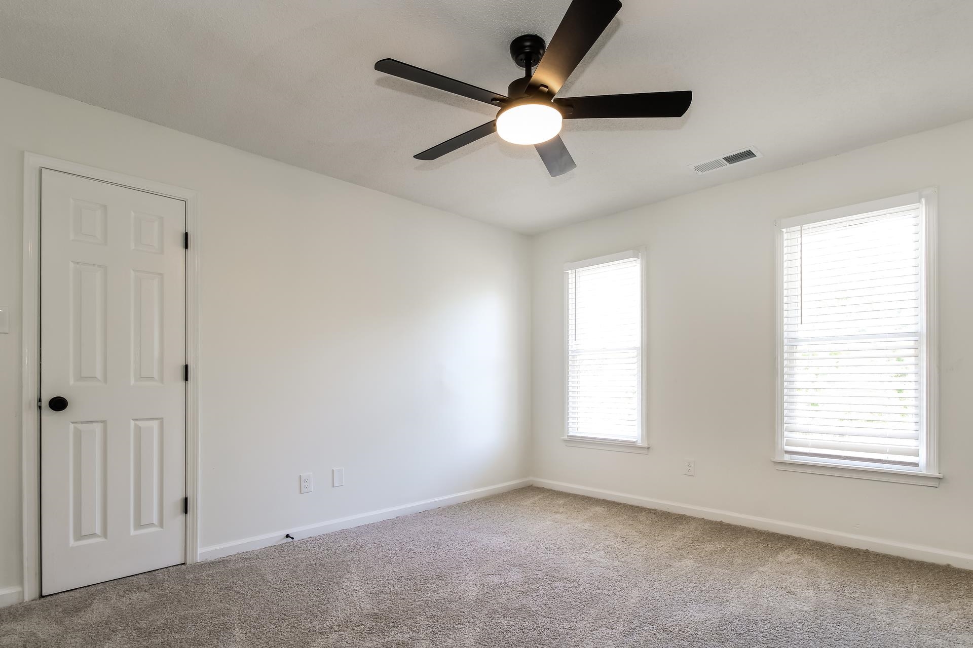 8729 Dexter Road Memphis, TN 38016 - Photo 13 of 20 Carpeted spare room featuring baseboards and a ceiling fan