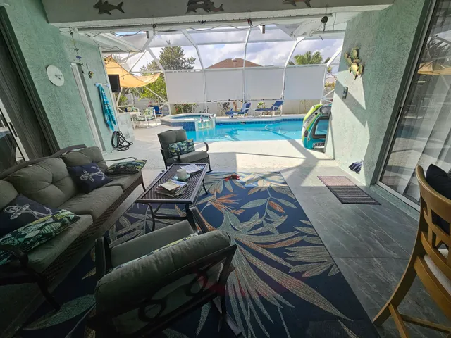 a living room with furniture and a table