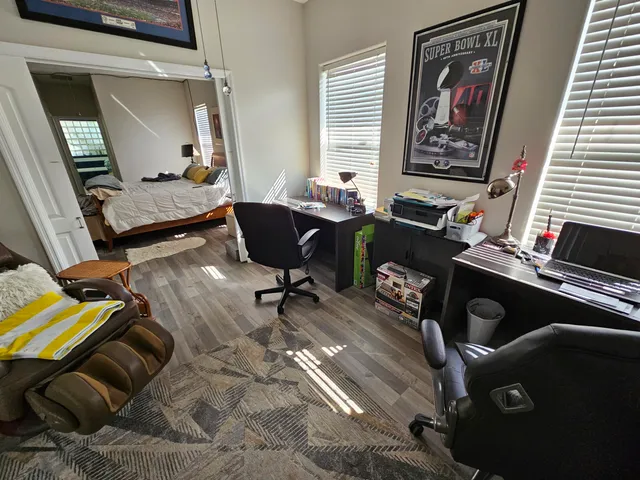 a living room with furniture and a window